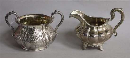 A Victorian silver two handled sugar bowl by Robert Hennell III, London, 1851 and a Victorian Irish silver milk jug, 19 oz.